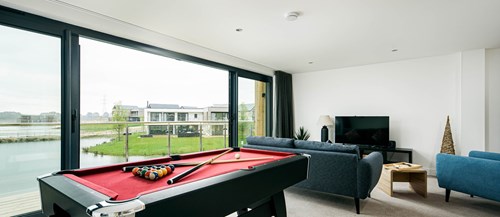 The living area and games room with pool table at White Nothe